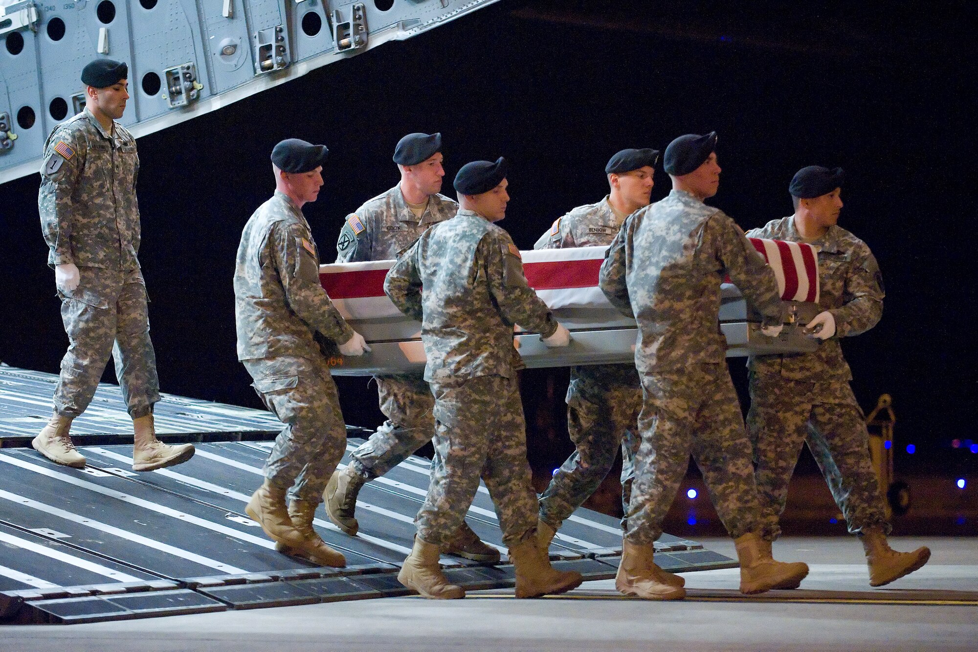 A U.S. Army carry team transfers the remains of Army Spc. Arronn D. Fields of Terra Haute, Ind., at Dover Air Force Base, Del., May 23, 2012. Fields was assigned to the 81st Troop Command, Indiana National Guard, Indianapolis, Ind. (U.S. Air Force photo/Adrian R. Rowan)