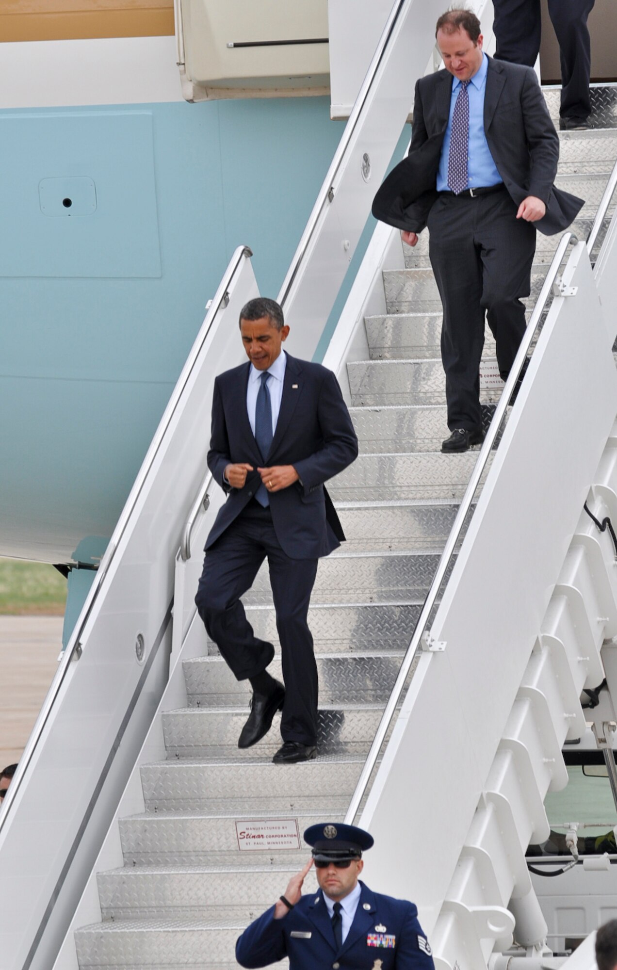 BUCKLEY AIR FORCE BASE, Colo. -- President Barack Obama makes his way down the staircase after landing here May 23, 2012. Obama made a public appearance and left Buckley a short time afterward. (U.S. Air Force photo by Senior Airman Christopher Gross)