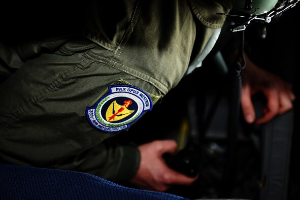 SPANGDAHLEM AIR BASE, Germany – Staff Sgt. Thomas Vesser, 351st Air Refueling Squadron in flight refueler, operates a boom to refuel aircraft during an orientation flight for 25 52nd Fighter Wing Airmen and spouses here May 23. The Airmen and spouses flew on a 351st ARS KC-135 stationed out of RAF Mildenhall during an in-flight refueling of 81st and 480th Fighter Squadron aircraft from Spangdahlem AB. The 351st ARS and 52nd FW aircrew train together to enhance their interoperability to perform in-flight refueling missions. (U.S. Air Force photo by Airman 1st Class Matthew B. Fredericks/Released)