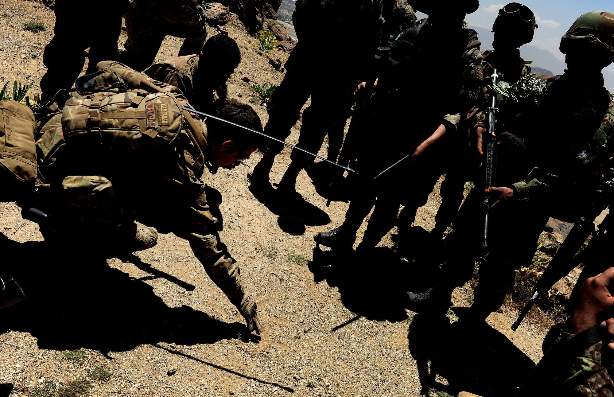 Air Force Security Forces members from the 439th Air Expeditionary Advisor Squadron advise members of the Afghan Air Force during a mounted and dismounted patrol outside of Kabul, Afghanistan, May 21, 2012. The mission, which was the first Afghan led quick reaction force patrol, consisted of a mounted and dismounted patrol. (U.S. Air Force photo/Staff Sgt. Clay Lancaster)