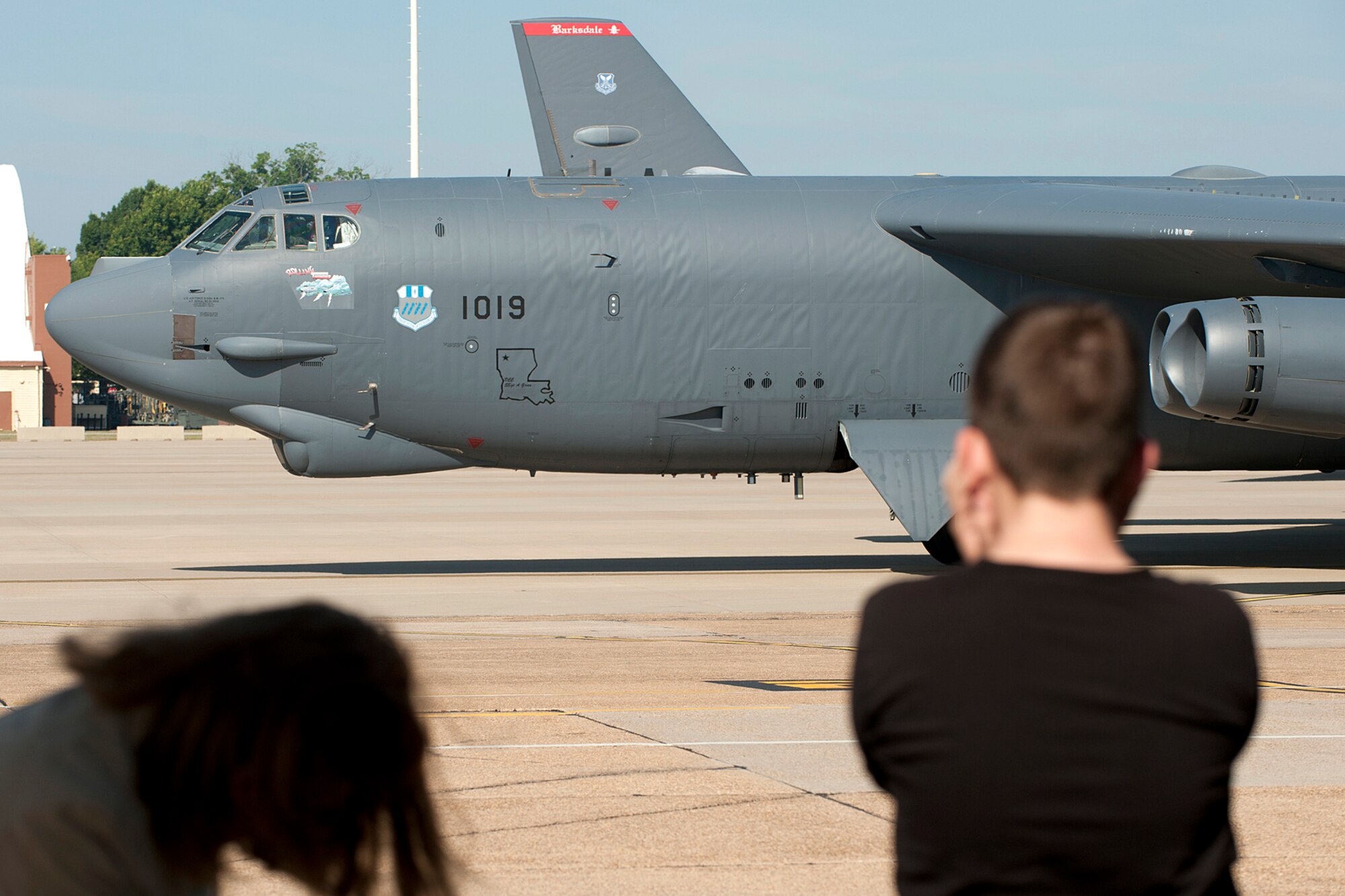 Colin Rimsky covers his ears as a B-52H Stratofortress taxis prior to takeoff for a mission from Barksdale Air Force Base, La., May 22, 2012. Colin is the son of U.S. Air Force Lt. Col. Michael Rimsky, 2nd Operations Support Squadron director of operations, and got a tour of a B-52 during Spouse Appreciation Day. (U.S. Air Force photo by Master Sgt. Greg Steele/Released)