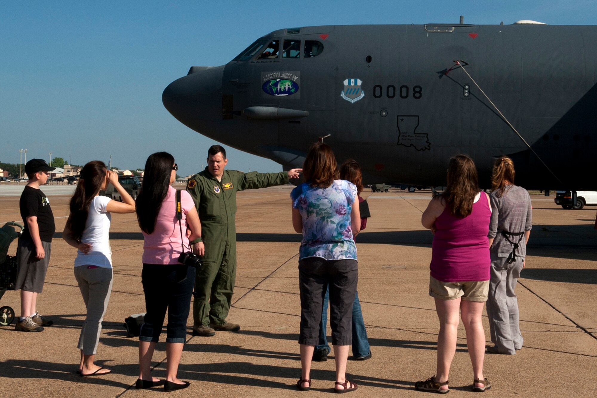 U.S. Air Force Lt. Col. Michael Rimsky, 2nd Operations Support Squadron director of operations, gives a tour of a B-52H Stratofortress during Spouse Appreciation Day, Barksdale Air Force Base, La., May 22, 2012. The squadron hosted the event, which also included a tour of the B-52 simulator. (U.S. Air Force photo by Master Sgt. Greg Steele/Released)