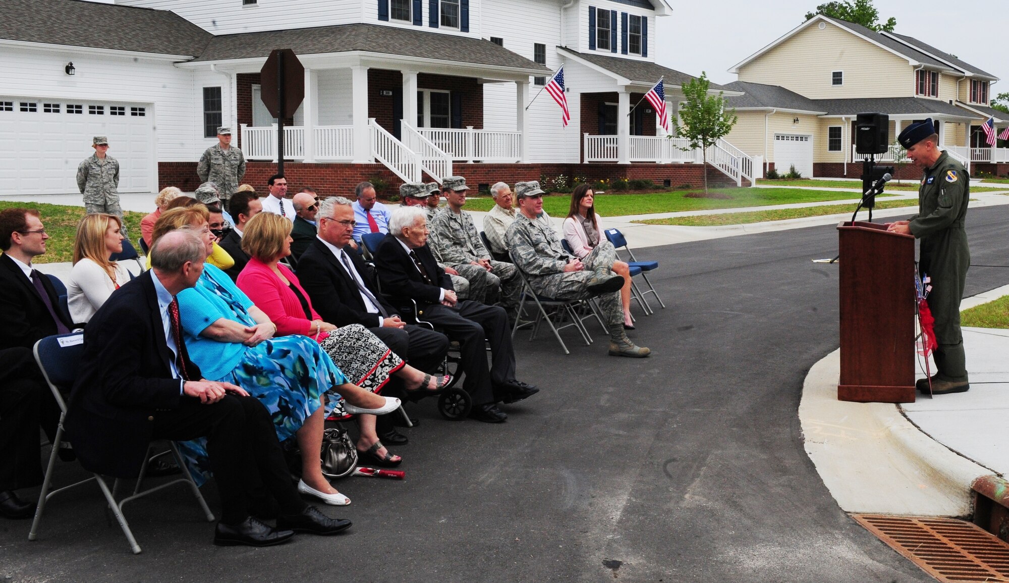 U.S. Air Force Col. Patrick Doherty addresses the crowd during a ceremony to unveil Don Allen Court in family housing on Seymour Johnson Air Force Base, N.C., May 18, 2012. The court was named after Staff Sgt. Don Allen, a World War II veteran, who served as a maintainer in the 334th Fighter Squadron and painted art on 56 aircraft. Reproductions of Allen’s nose art hang in the Seymour Johnson Consolidated Support Center. Doherty, the 4th Fighter Wing commander, is from Bellevue, Neb. (U.S. Air Force photo/Tech. Sgt. Tammie Moore/Released)