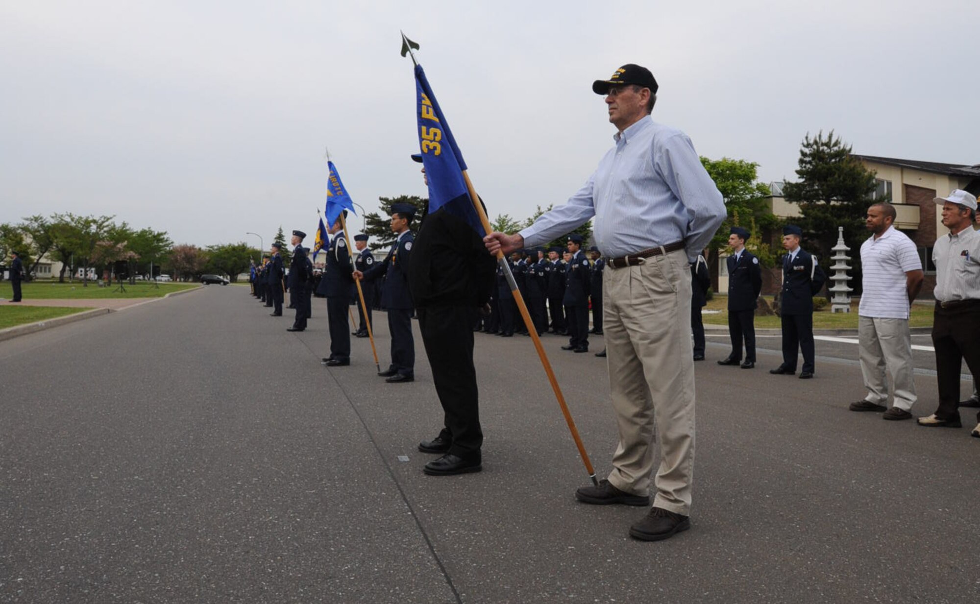 Charles Hollis, retired Chief Master Sgt., stands at parade rest with over 150 servicemembers, retirees and civilians during a Memorial Day retreat ceremony at Misawa Air Base, Japan, May 24, 2012. The ceremony was held to honor U.S. service members who died defending the nation’s freedom in past and present times of armed conflict. In 1868, Memorial Day was formed to honor Union and Confederate soldiers who died during the Civil War. (U.S. Air Force photo by Airmen Kenna Jackson/Released)