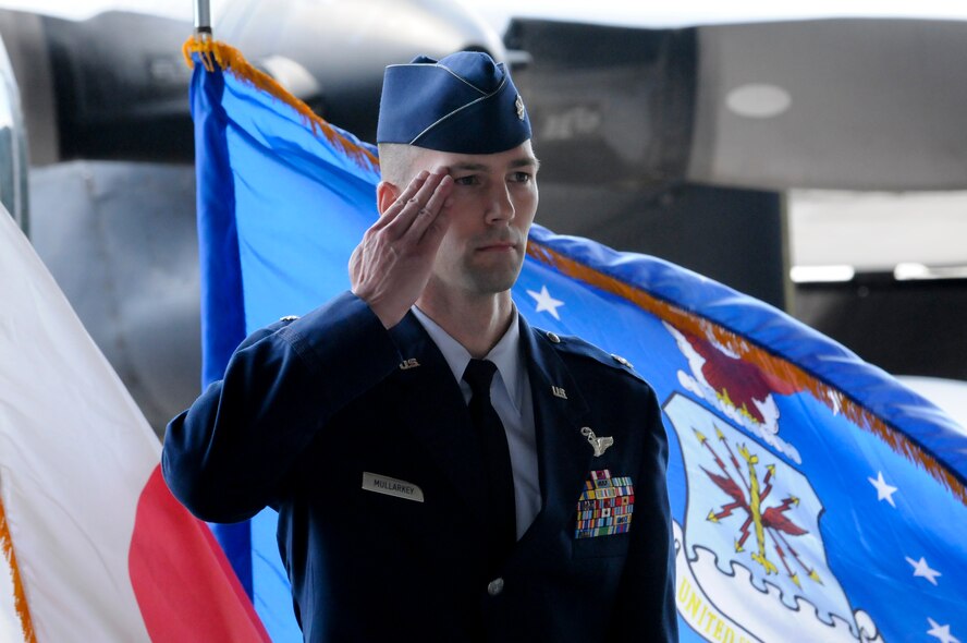 U.S. Air Force Lt. Col. Mark Mullarkey renders his first salute as commander to the formation of Airmen of the 17th Special Operations Squadron on Kadena Air Base, Japan, May 24, 2012. For Mullarkey, former operations officer of the 17th SOS, commanding the 17th SOS is his first assignment as a commander. (U.S. Air Force photo/Airman Tara A. Williamson)