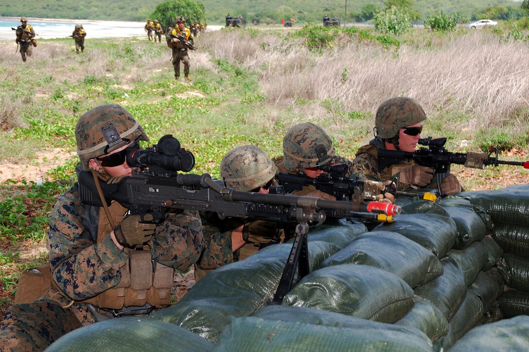 U.S. Marines conduct a clearing exercise in an urban terrain training area as part of a simulated amphibious assault during Cooperation Afloat Readiness and Training Thailand 2012 in Hat Yao, Thailand, May 23, 2012. The Marines are assigned to Foxtrot Company, 2nd Battalion, 3rd Marine Regiment.
