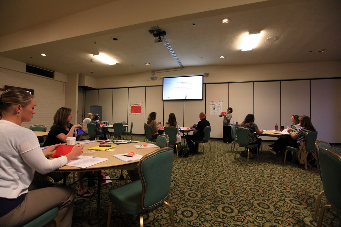 Family members of service members attend a Family Readiness Volunteer Training class at the Marine Corps Family Team Building on Camp Pendleton, May 24. The class explains the structure of the program, roles and responsibilities, communication within the program and resources around the base.