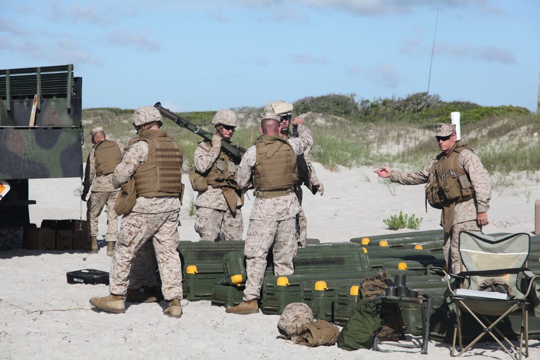 Marines with 2nd Low Altitude Air Defense Battalion prepare a PL-87 Stinger Missile before approaching the firing line at Onslow Beach aboard Marine Corps Base Camp Lejeune, N.C., May 25. Although the Marines with 2nd LAAD have acted as a security battalion while deployed they still keep their primary mission skills up to order incase a threat does appear. “There will always be a time and place for this training to pay off,” said Lt. Col. Joel A. Burdette, commanding officer of the air defense battalion. "Unmanned aerial vehicles could become a possible threat to us at anytime. That is why my Marines continue to train with the Stinger Missile.”