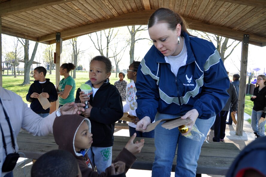 Air Force Master Sgt. Star Hoffland, NCO in charge of readiness at the Charles C. Carson Center for Mortuary Affairs, embraces the service before self core value and lends a helping hand at a community outreach event April 7, 2012 at Dover Air Force Base, Del. Hoffland was recently notified that she is a potential match for a leukemia patient in need of a bone marrow transplant. (U.S. Air Force photo/Staff Sgt. James W. Jackson III)