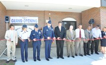 YOUNGSTOWN AIR RESERVE STATION, Ohio — The 910th Airlift Wing celebrated the grand opening of the second phase of the Eagle's Nest lodging here May 21.  A ceremonial ribbon cutting took place during the ceremony.  Cutting the ribbon for the nearly $10 million new lodging wing (left to right) are: Chris Halapy, project executive,Shook RJE Construction, Colonel Teresa Hams, commander of the 910th Mission Support Group, Colonel Nicholas Desport, AFRC Command Civil Engineer, Colonel Reinhard Schmidt, commander of the 910th Airlift Wing, Congressman Tim Ryan, 17th District Ohio, Jerry Cardinal, AFRC Services, Robert Woods, Youngstown ARS Chief of Civil Engineers, Kevin Jefferson, U.S. Army Corps of Engineers, Resident Engineer Brad Ryczko, U.S. Army Corps of Engineers, Project Manager and Cheryl Taylor, Youngstown ARS Lodging Manager.  U.S. Air Force photo by Staff Sgt. Megan Tomkins.
