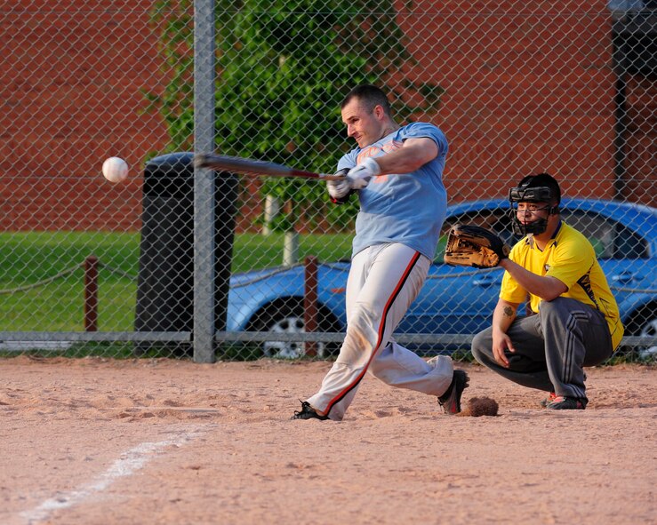 RAF MILDENHALL, England – Nathaniel Goodman, 100th Communications Squadron, bats during a softball game against the 100th Logistics Readiness Squadron here May 23, 2012. The intramural softball league began May 9 and is composed of 12 teams from various squadrons around base. (U.S. Air Force photo/Senior Airman Ethan Morgan) 