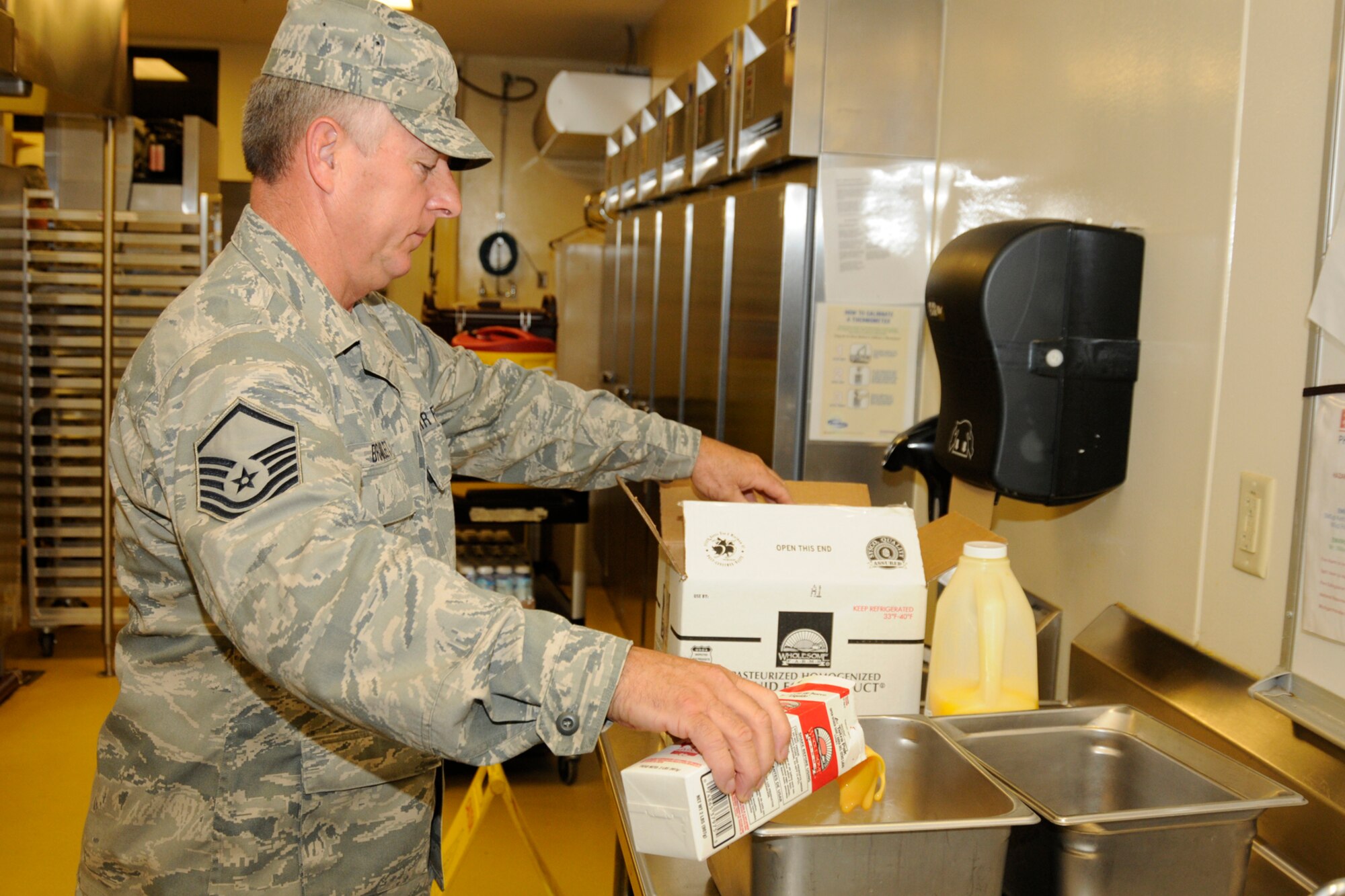 Master Sgt. Nolan Bramlett, 188th Fighter Wing, Arkansas Air National Guard, begins to prepare breakfast in the Thunder Bay Dining Facility at the Alpena Combat Readiness Training Center in Alpena, Mich., May 25, 2012. The Services Airman was supporting a medical disaster response training exercise at the CRTC. (U.S. Air Force photo by TSgt. David Kujawa)