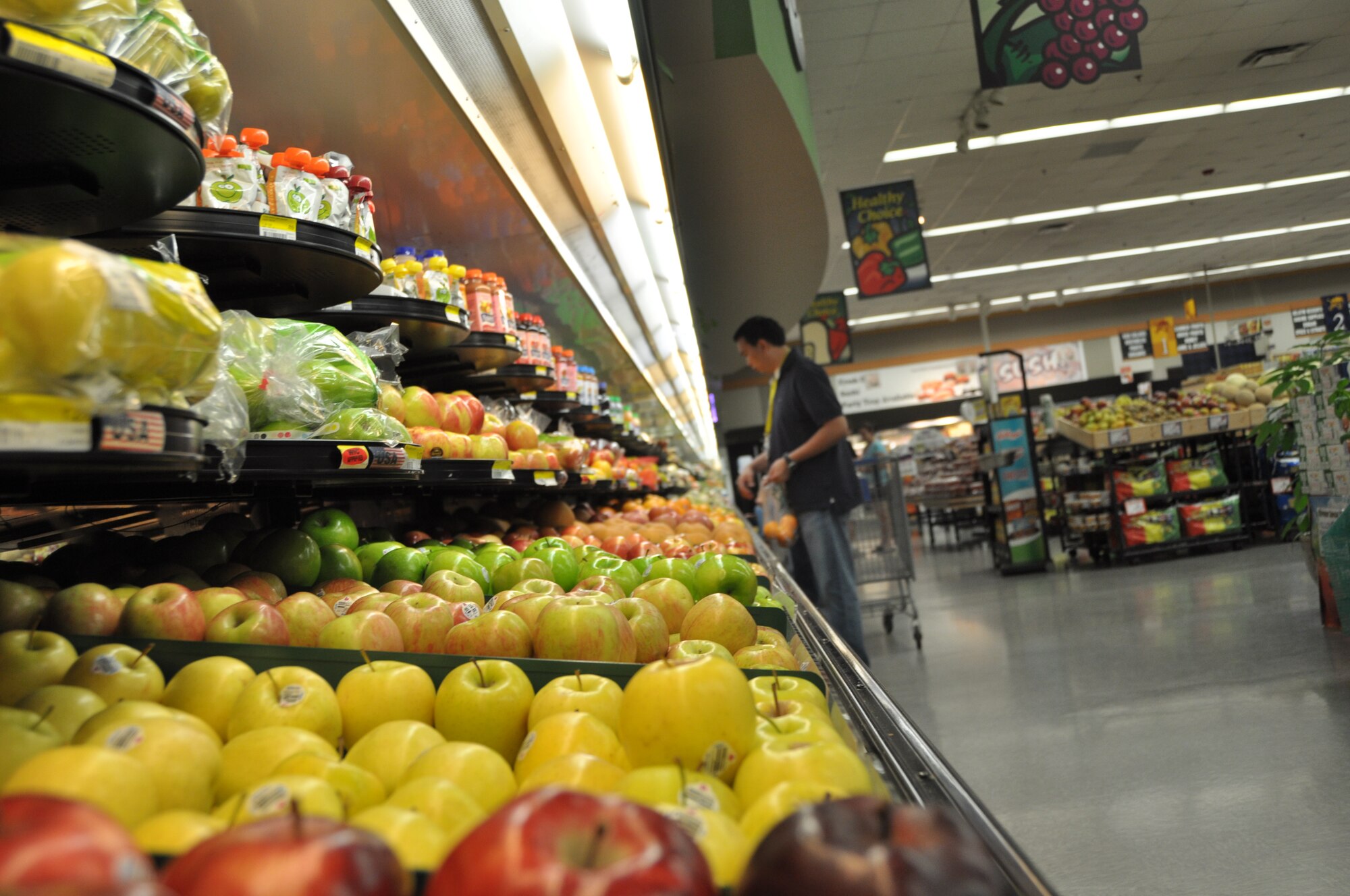 A customer shops in the produce section at the Osan Air Base commissary. For the second year in a row, the Osan commissary won the Dan Daniel Award for Best Large Commissary Overseas. They are tops among the Defense Commissary Agency’s 247 stores worldwide, and the awards are named in honor of a government official who protected the commissary benefit and championed quality-of-life issues for the military and their families. (U.S. Air Force photo/Staff Sgt. Stefanie Torres)