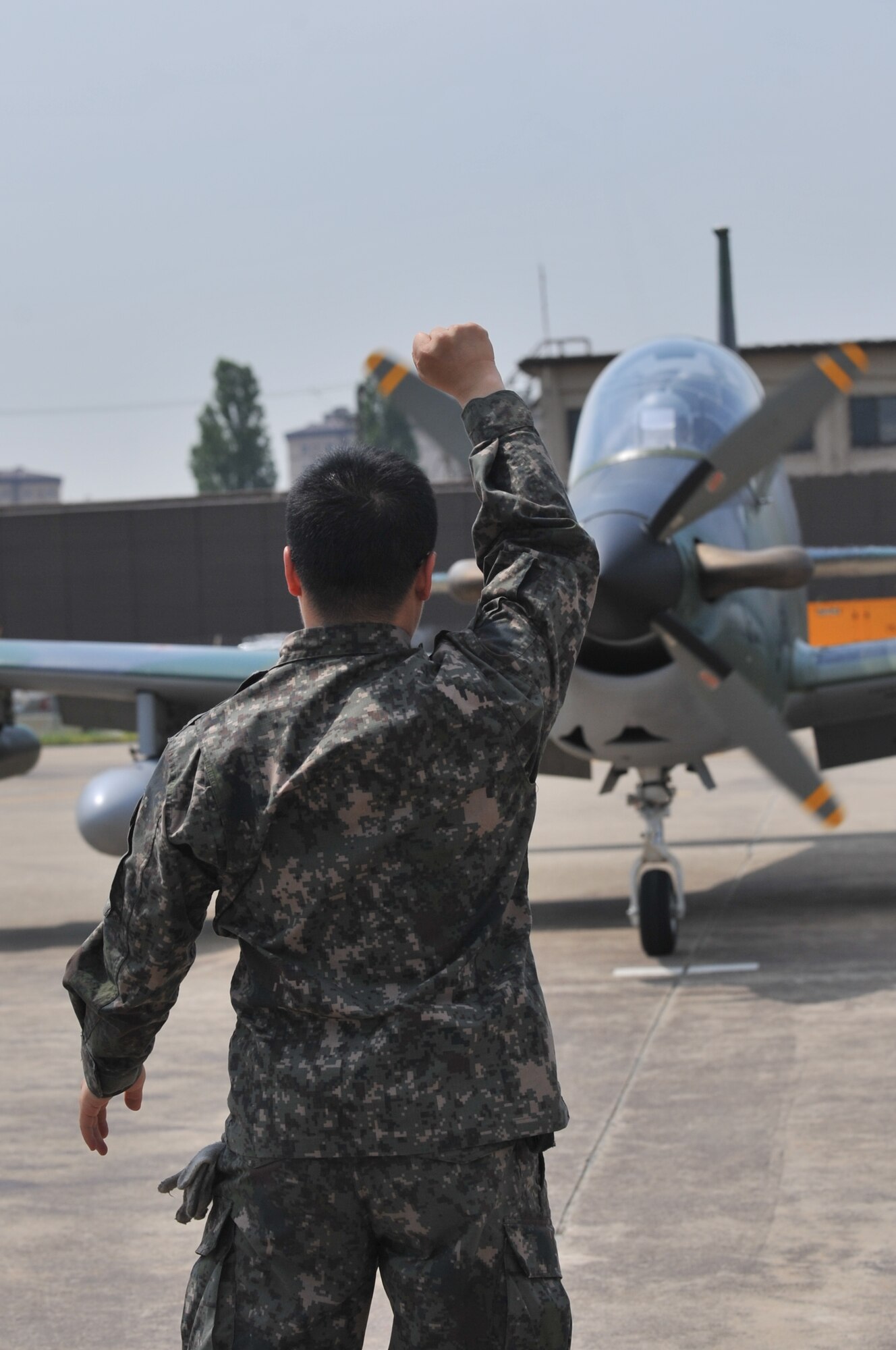 Two Republic of Korea Air Force KA-1 Woongbi forward air control aircraft pilots flew to Osan Air Base to train with their U.S. counterparts May 22-23. Aptly named the Buddy Wing program, these ROKAF pilots from the 237th Tactical Control Squadron at Seoul Air Base conduct bilateral training with the U.S. Air Force a few times a year. (U.S. Air Force photo/Staff Sgt. Stefanie Torres)