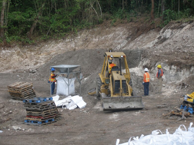 Contaminated soil is removed from the Edoni Formerly Used Defense Site (FUDS) on Saipan. The extraction site was used by the U.S. military during and after World War II as a waste repository. 