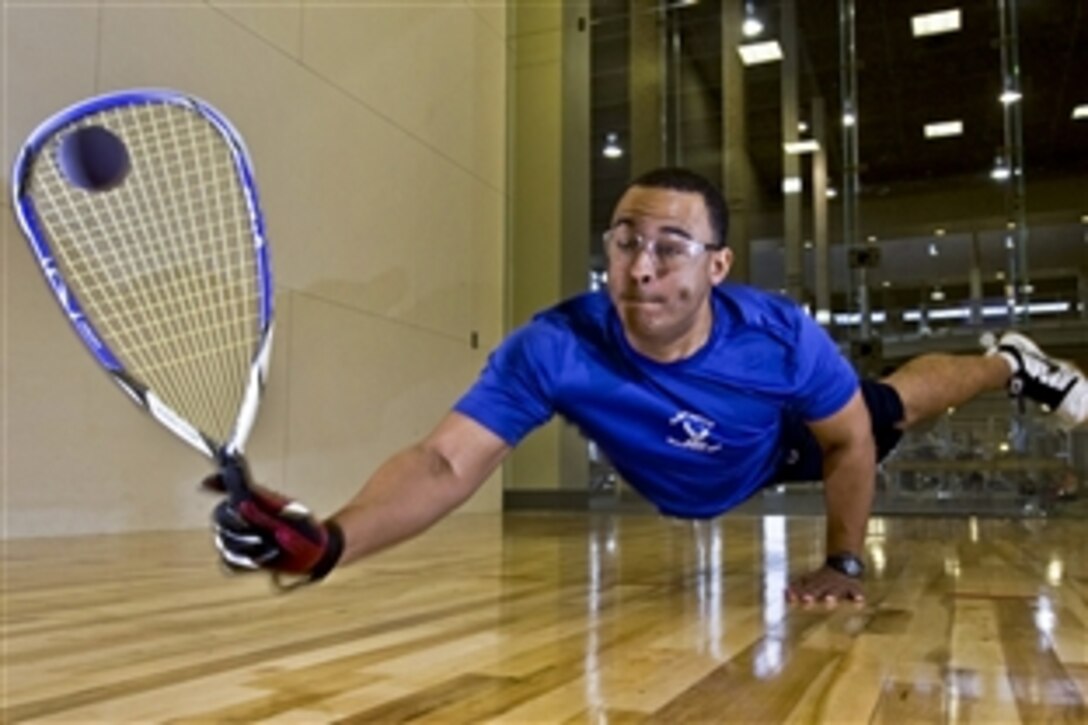 Air Force 2nd Lt. Maurice McKoy dives to hit a raquetball on Nellis Air Force Base, Nev., May 17, 2012. The chief of Air Force sports picked McKoy, who has played competitive racquetball for more than 12 years, to represent the Air Force in the 45th National Racquetball Singles Championship in Fullerton, Calif. McKoy is a 99th Comptroller Squadron financial officer.
