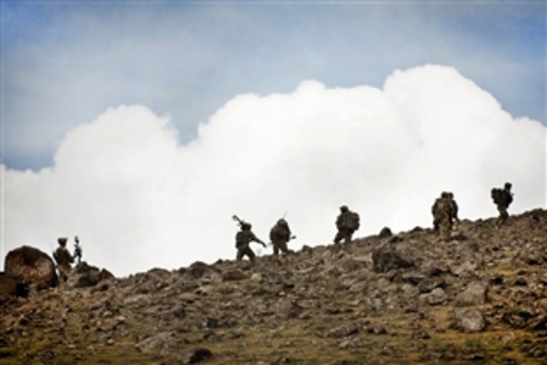 U.S. paratroopers serving as an overwatch element move their observation post higher on a hill during combat operations in Ghazni province, Afghanistan, May 19, 2012. The paratroopers are assigned to the 82nd Airborne Division’s 3rd Squadron, 73rd Cavalry Regiment, 1st Brigade Combat Team.