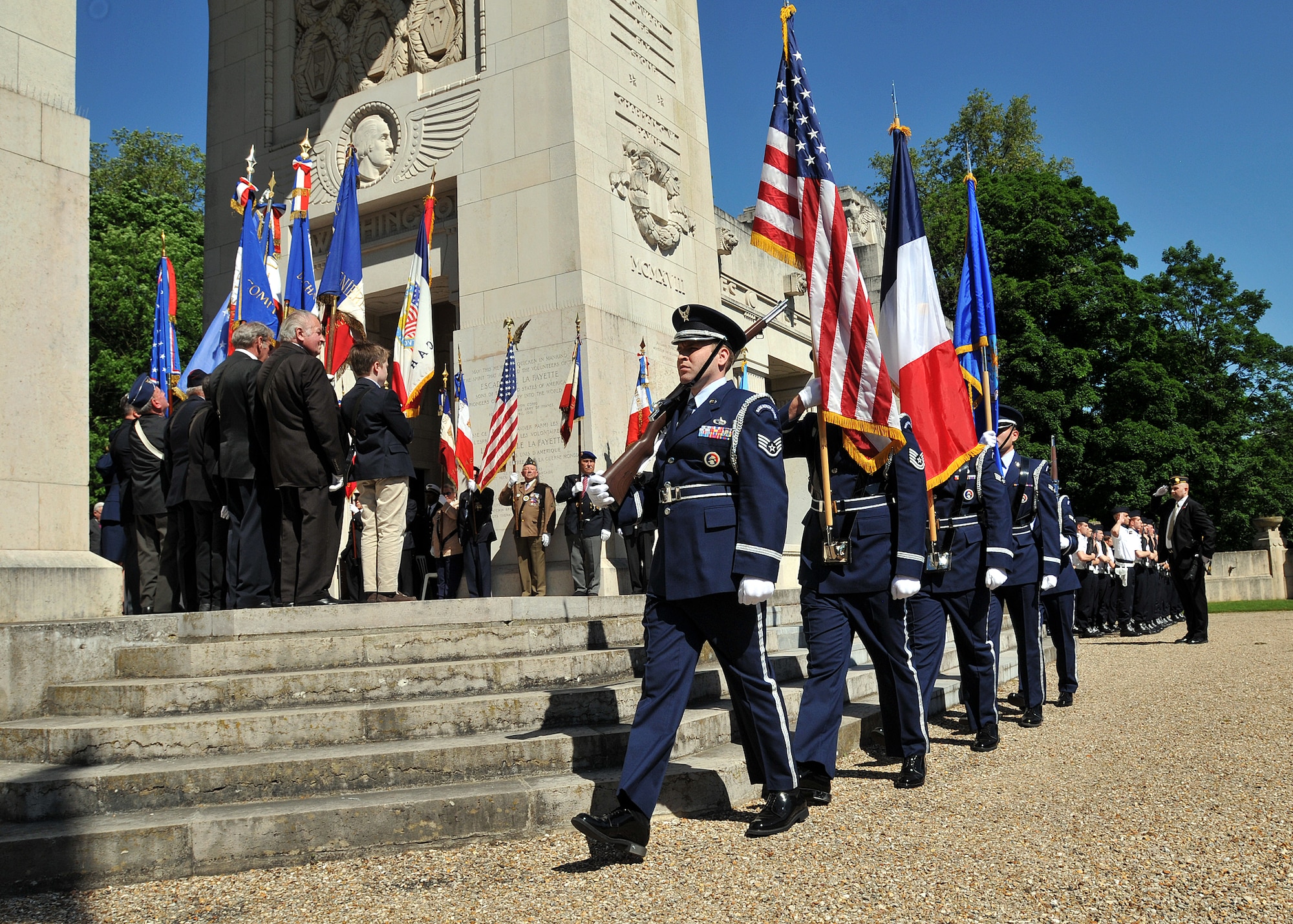 Members of the Spangdahlem Honor Guard post colors during a Memorial Day ceremony at the Lafayette Escadrille Memorial, located on the outskirts of Paris, May 26, 2012. The memorial honors American pilots who volunteered to join the French Escadrille Lafayette and the Lafayette Flying Corps during World War I and also serves as a final resting place for the remains of 49 of those pilots. (U.S. Air Force Photo by Tech. Sgt. Markus M. Maier) (Released)
