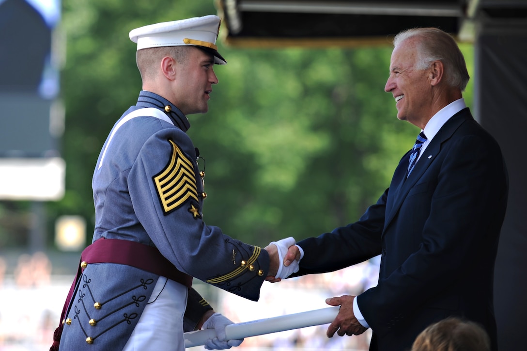 Vice President Joe Biden shakes hands with cadet First Captain Charles Phelps during graduation at the U.S. Military Academy in West Point, N.Y., May 26, 2012. U.S. Army photo by Staff Sgt. Teddy Wade
