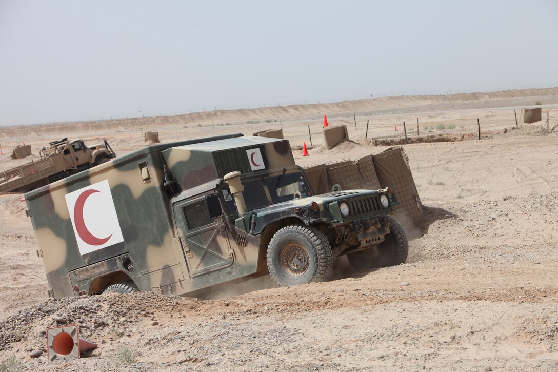 Soldiers with the 5th Kandak, 1st Brigade, Afghan National Army, participate in Combat Vehicle Operators Training along with the Combat Logistics Battalion 5 Embedded Partnership Team at Camp Dwyer, Afghanistan, May 28. The course is designed to improve the driving capabilities of the ANA soldiers and decrease the amount of transmission problems that occur with the trucks.