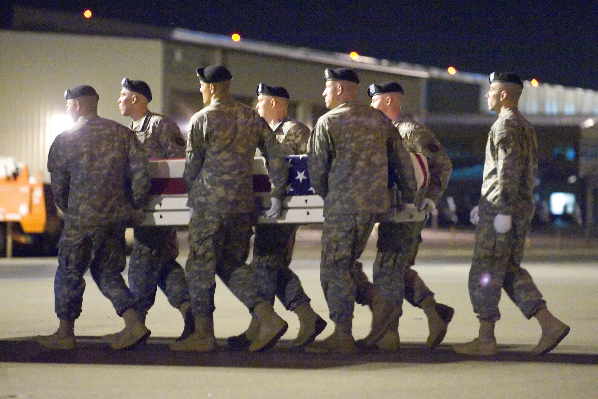 A U.S. Army carry team transfers the remains of Army Spc. Vilmar Galarza Hernandez of Salinas, Calif., at Dover Air Force Base, Del., May 27, 2012. Hernandez was assigned to the 4th Battalion, 23rd Infantry Regiment, 2nd Stryker Brigade Combat Team, 2nd Infantry Division, Joint Base Lewis-McChord, Wash. (U.S. Air Force photo/Adrian R. Rowan)