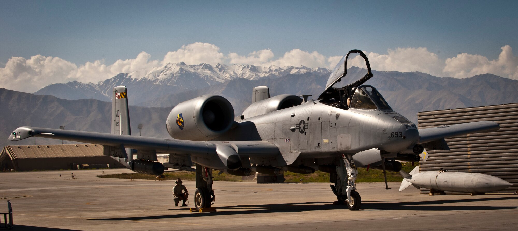 Airmen from the 455th Air Expeditionary Wing prepare a U.S. Air Force A-10 Thunderbolt II for a mission at Bagram Airfield, Afghanistan, May 27, 2012. The 455th AEW is responsible for providing responsive and precise close-air support to NATO and Afghan ground forces operating in Afghanistan. (U.S. Air Force photo/Capt. Raymond Geoffroy)