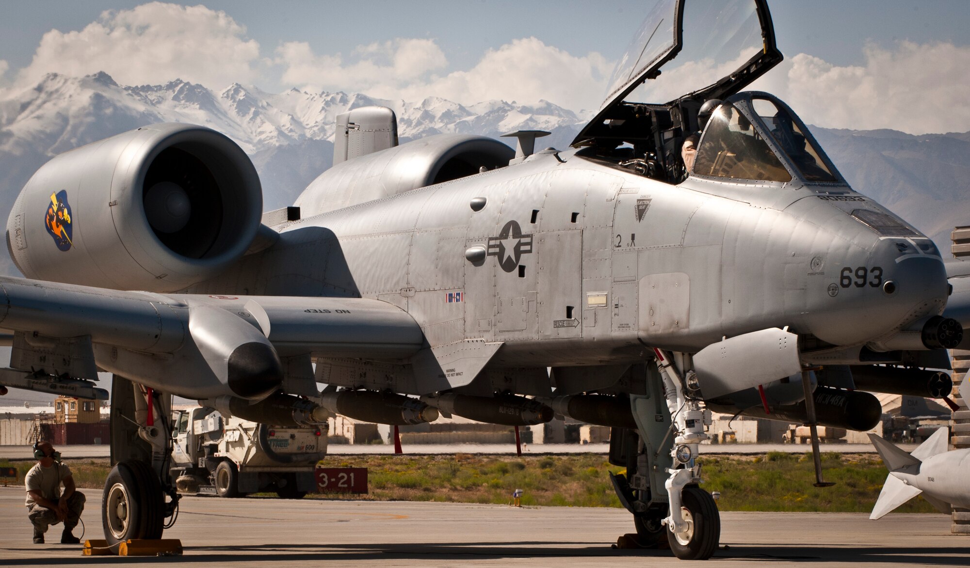 Airmen from the 455th Air Expeditionary Wing prepare a U.S. Air Force A-10 Thunderbolt II for a mission at Bagram Airfield, Afghanistan, May 27, 2012. Affectionately called the ‘Warthog’, the A-10 is a specialized ground attack aircraft which provides close air support to ground forces operating in Afghanistan. (U.S. Air Force photo/Capt. Raymond Geoffroy)