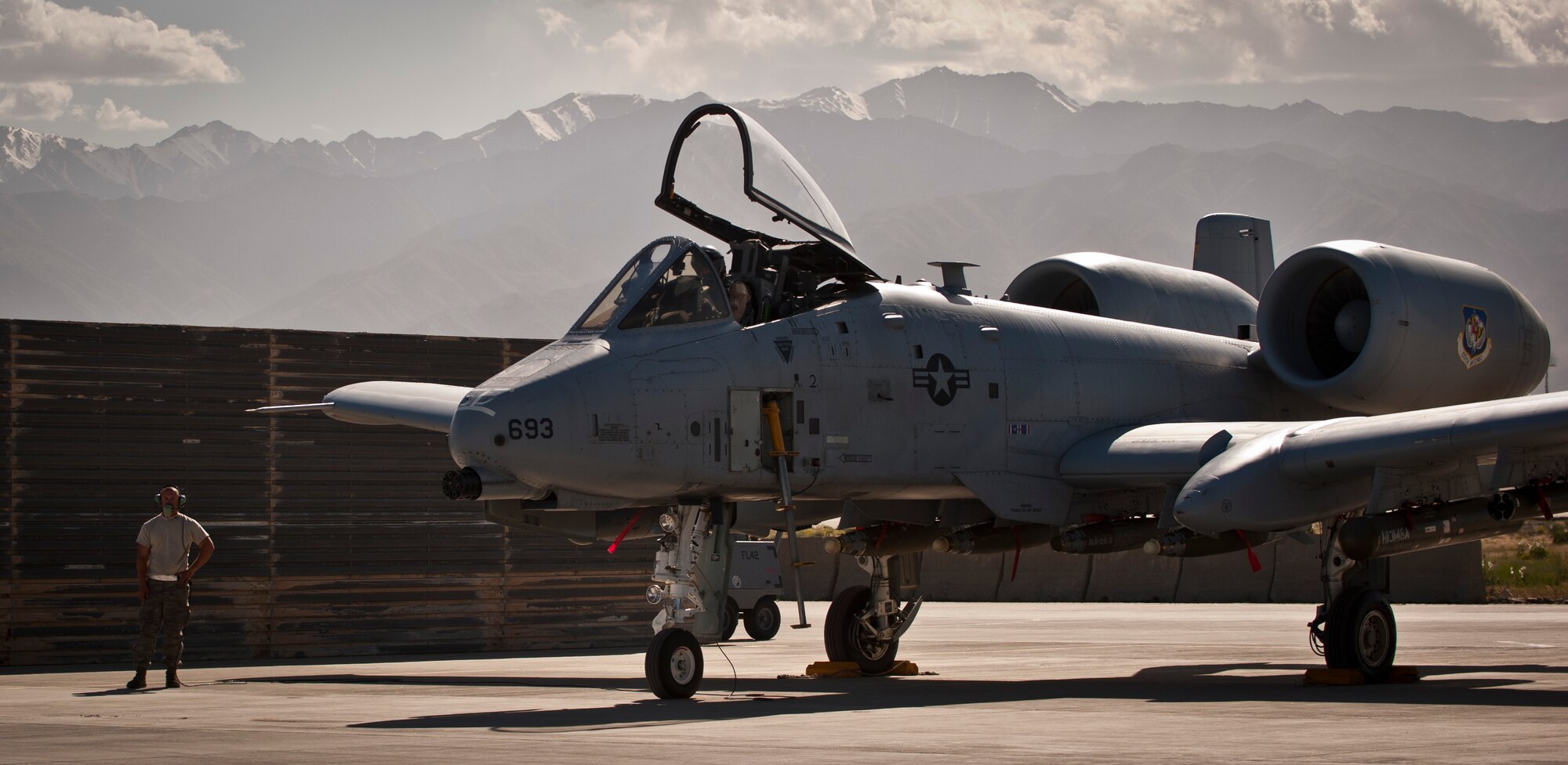 Airmen from the 455th Air Expeditionary Wing prepare a U.S. Air Force A-10 Thunderbolt II for a mission at Bagram Airfield, Afghanistan, May 27, 2012. The 455th AEW is responsible for providing responsive and precise close air support to NATO and Afghan ground forces operating in Afghanistan. (U.S. Air Force photo/Capt. Raymond Geoffroy)