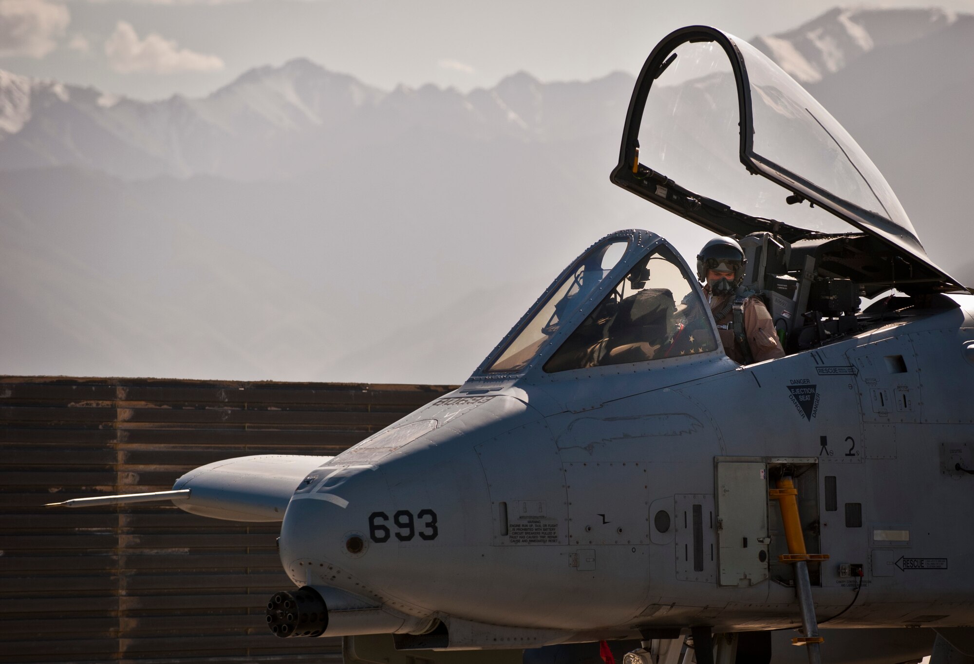 A pilot assigned to the 104th Expeditionary Fighter Squadron prepares a U.S. Air Force A-10 Thunderbolt II for a mission at Bagram Airfield, Afghanistan, May 27, 2012. Bagram Airmen provide around-the-clock, close-air support to NATO and Afghan ground forces operating in Afghanistan. (U.S. Air Force photo/Capt. Raymond Geoffroy)