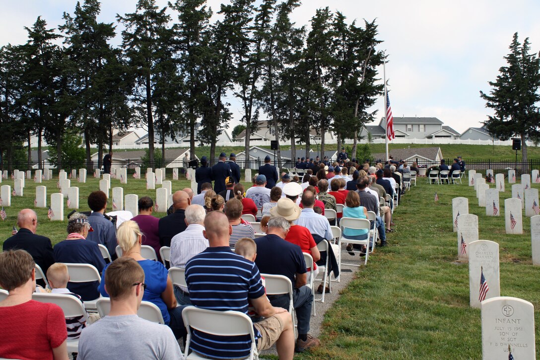 OFFUTT AIR FORCE BASE, Neb. - Maj. Gen. Robert Wheeler, Deputy Director, Nuclear Operations, U.S. Strategic Command, speaks to military and civilian guests during a Memorial Day ceremony held at the base cemetery May 30, 2012.  Approximately 100 guests were present to honor fallen servicemembers  as well as those who currently serve in the military.