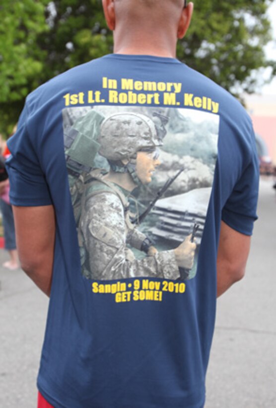 First Lieutenant Michael Dorsey, Battalion Landing Team, 3rd Battalion, 5th Marines, Camp Pendleton, Calif., wears a t-shirt in honor of a fallen brother during the Laguna Hills Memorial Day Half Marathon in Laguna Hills, Calif. May 28.  Dorsey was one member of Team Kelly, but more than 100 Marines from the battalion joined him in the Memorial Day run.  Laguna Hills adopted the battalion in 2007 and supports it while they are deployed as well as when they are home.