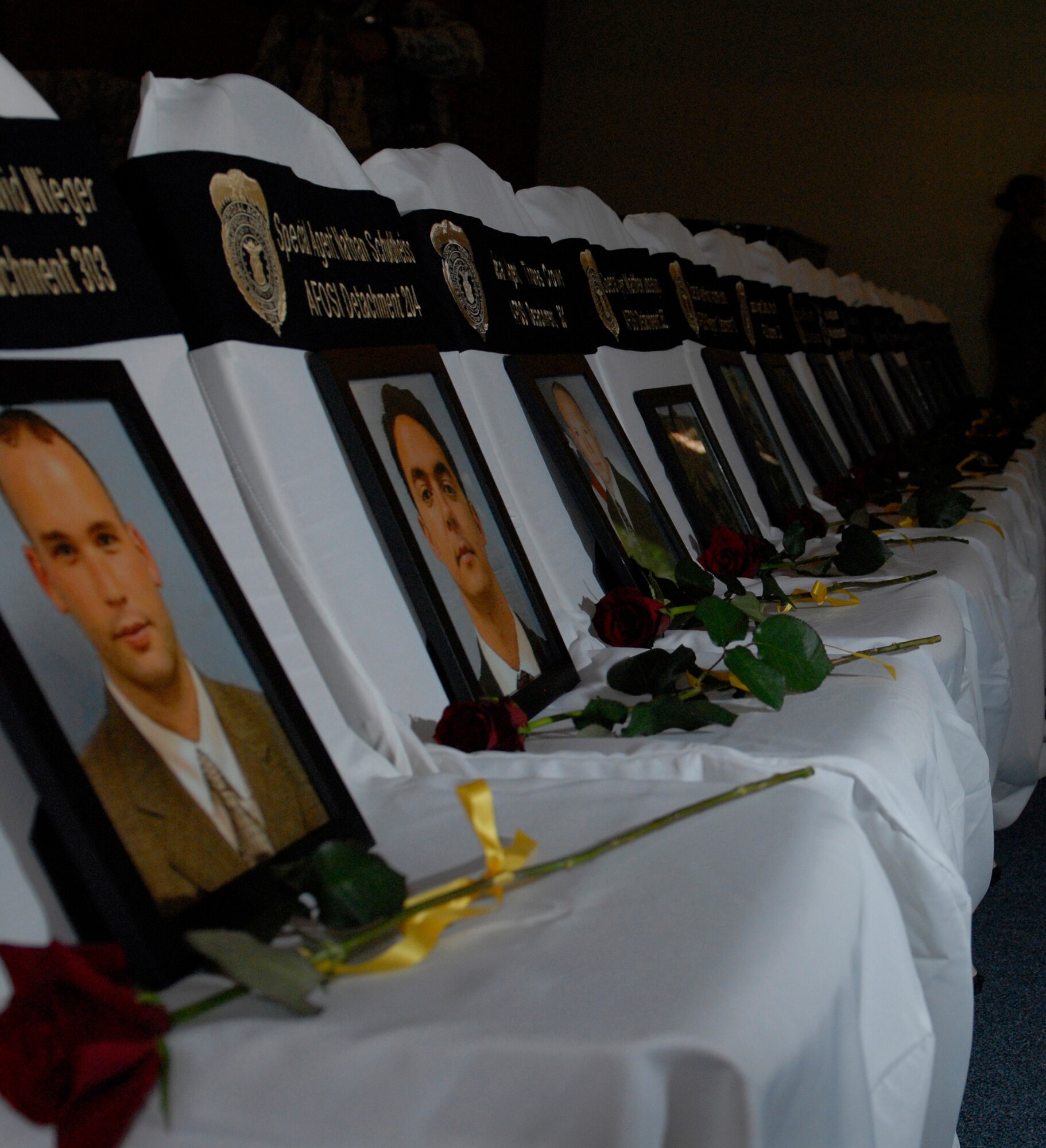 Security forces and Air Force Office of Special Investigations personnel who have given their lives in the line of duty were honored at a National Police Week memorial service at Chapel Two on Kadena Air Base, Japan, May 24, 2012. The memorial wrapped up a week of 18th Security Forces Squadron activities held to honor fallen comrades. (U.S Air Force photo/Airman 1st Class Malia Jenkins)  