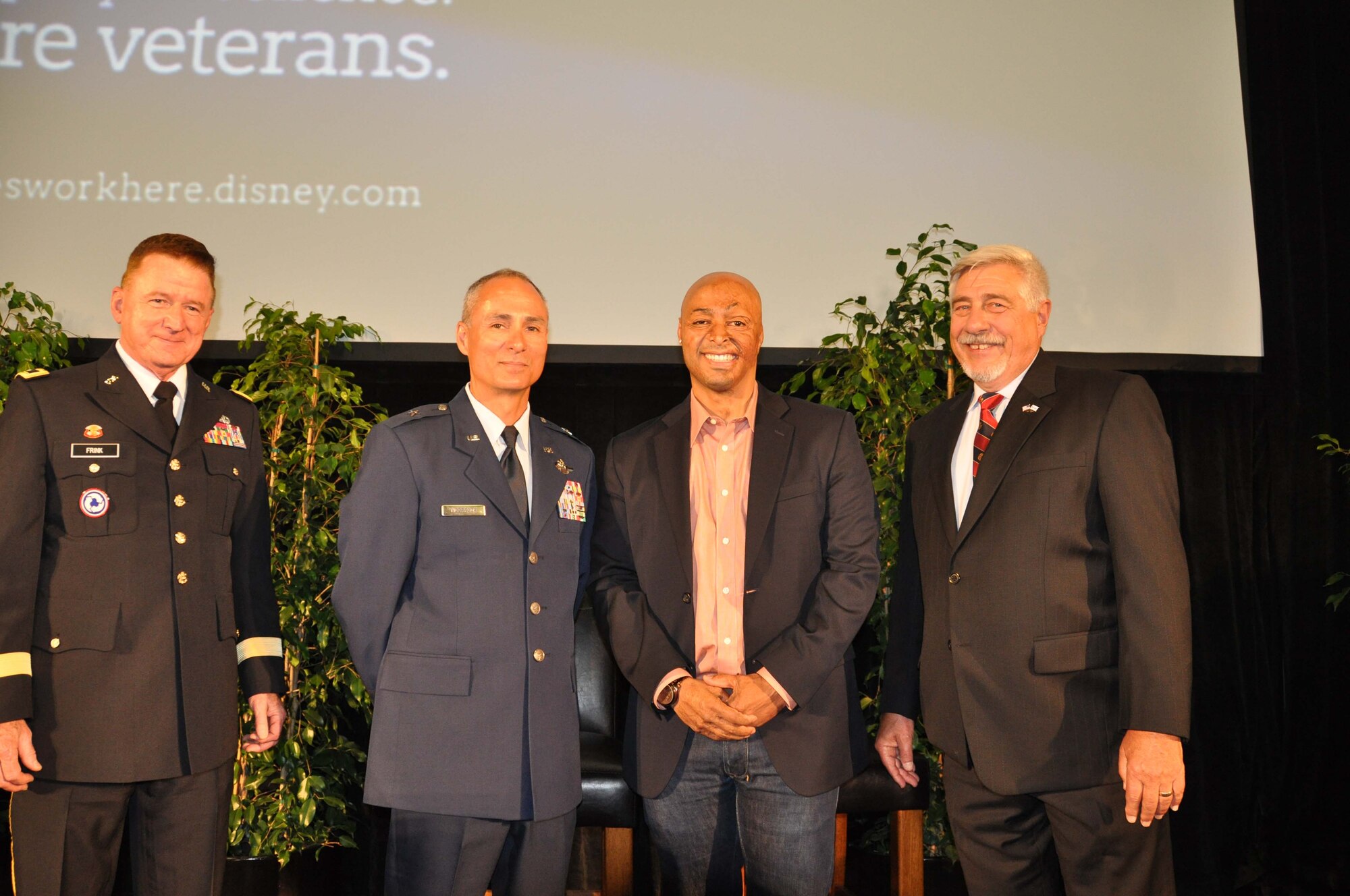 Major Gen. William Frink, Jr., Commanding General, 79th Army Reserve Sustainment Support Command, Los Alamitos, Calif., Brig. Gen. Karl McGregor, 452d Air Mobility Wing commander, J. R. Martinez, U.S. Army veteran and actor, and David McGinnis, Acting Assistant Secretary of Defense for Reserve Affairs, attend the Walt Disney Company's "Heroes Work Here" initiative on May 22 at their Burbank, Calif. studios lot. One of the company's goals is to hire 1,000 veterans. More than 300 veterans attended the job event hosted in conjunction with the Employer Support of the Guard and Reserve (ESGR). Disney Chairman and CEO Bob Iger welcomed veterans to the event designed to help attendees sharpen their job-seeking skills. Participants also had the opportunity to meet Disney recruiters and network with Cast Members who served in the military. (U.S. Air Force photo by Lt Col Don Traud)