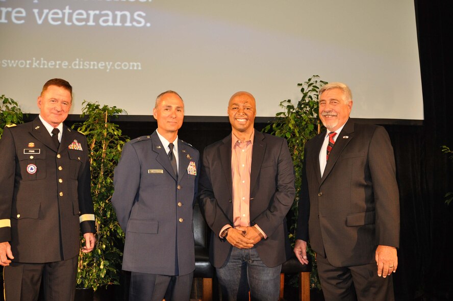 Major Gen. William Frink, Jr., Commanding General, 79th Army Reserve Sustainment Support Command, Los Alamitos, Calif., Brig. Gen. Karl McGregor, 452d Air Mobility Wing commander, J. R. Martinez, U.S. Army veteran and actor, and David McGinnis, Acting Assistant Secretary of Defense for Reserve Affairs, attend the Walt Disney Company's "Heroes Work Here" initiative on May 22 at their Burbank, Calif. studios lot. One of the company's goals is to hire 1,000 veterans. More than 300 veterans attended the job event hosted in conjunction with the Employer Support of the Guard and Reserve (ESGR). Disney Chairman and CEO Bob Iger welcomed veterans to the event designed to help attendees sharpen their job-seeking skills. Participants also had the opportunity to meet Disney recruiters and network with Cast Members who served in the military. (U.S. Air Force photo by Lt Col Don Traud)