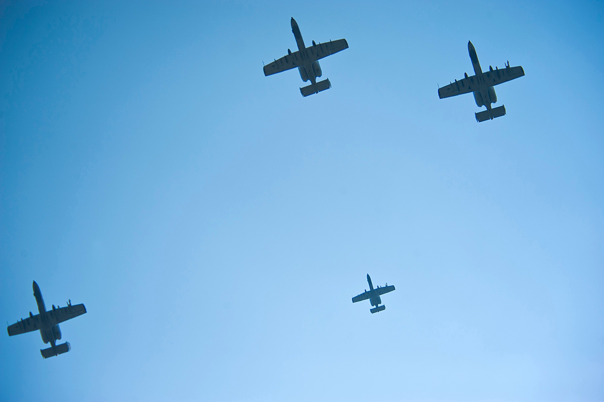 Four A-10C Thunderbolt II aircraft from Moody Air Force Base, Ga., perform a missing man formation during a memorial service in honor of retired U.S. Air Force Lt. Col. Donald Bryan May 26, 2012, in Valdosta, Ga. Missing man formations are aerial salutes performed at a funerals or memorial events, typically in memory of a fallen pilot. Bryan was a decorated World War II pilot who passed away May 15 at the age of 90. (U.S. Air Force photo by Staff Sgt. Jamal D. Sutter/Released) 