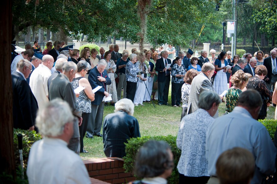 Friends and family of retired U.S. Air Force Lt. Col. Donald Bryan, along with members of the Moody Air Force Base and South Georgia community, pay respects during a memorial service in honor of Bryan May 26, 2012, at Christ Episcopal Church in Valdosta, Ga. Bryan was a double ace pilot officially credited with 13.3 downed enemy aircraft, including five in one day. (U.S. Air Force photo by Staff Sgt. Jamal D. Sutter/Released) 