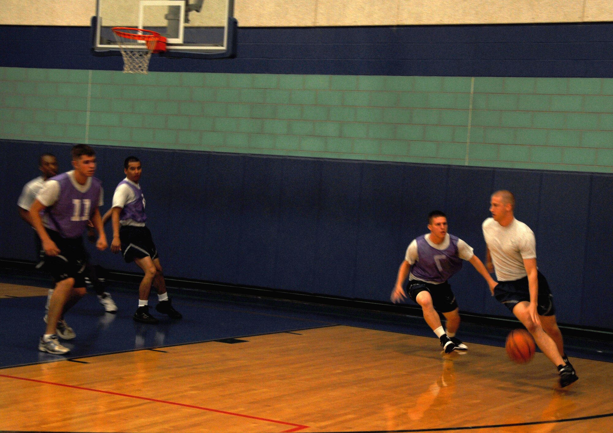 GOODFELLOW AIR FORCE BASE, Texas— Airmen battle it out in a basketball tournament during the quarterly Sports and Safety Day, May 24. The units with the most wins and participation points later competed for the Large and Small Unit awards. (U.S. Air Force photo/Airman 1st Class Jessica Keith)