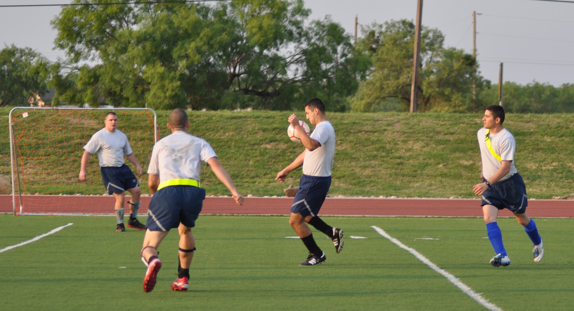 GOODFELLOW AIR FORCE BASE, Texas—Air Force students face-off in a soccer tournament during the quarterly Sports and Safety Day, May 24. The top scoring teams, a composite score based on points and unit participation in several events, get to compete for the Large and Small Unit awards later in the day.  (U.S. Air Force photo/Airman 1st Class Jessica Keith)