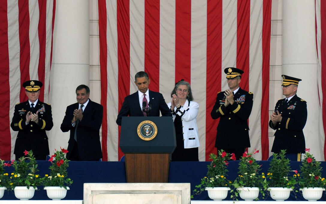 President Barack Obama receives a standing ovation after delivering his 2012 Memorial Day speech at Arlington National Cemetery May 28. President Obama’s speech included honoring fallen service members, thanking all veterans for their service and thanking civilians for supporting the troops.  This year marked the 144th anniversary of Memorial Day observance. (U.S. Air Force photo/Staff Sgt. Keyonna Fennell)