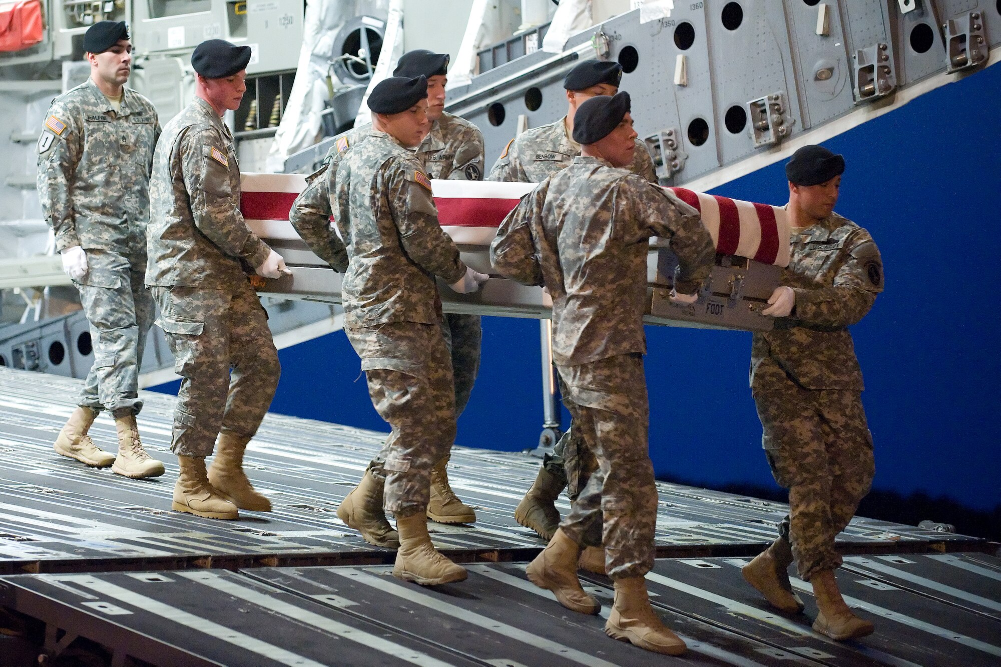 A U.S. Army carry team transfers the remains of Army Spc. Tofiga J. Tautolo of Wilmington, Calif., at Dover Air Force Base, Del., May 28, 2012. Tautolo was assigned to the 3rd Squadron, 61st Cavalry Regiment, 4th Brigade Combat Team, 4th Infantry Division, Fort Carson, Colo. (U.S. Air Force photo/Adrian R. Rowan)