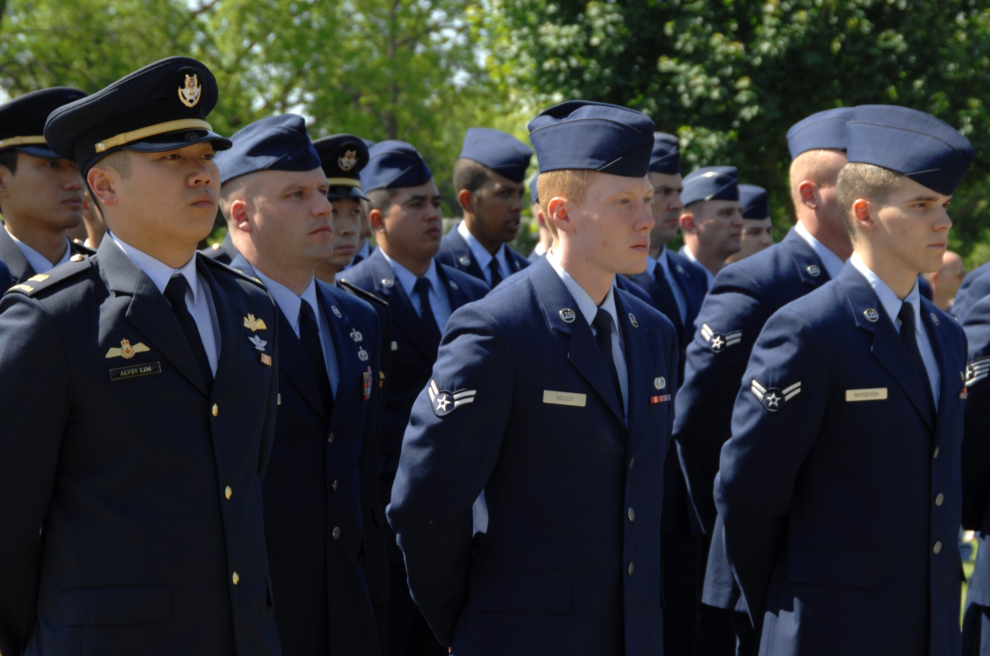 Gunfighters stationed at Mountain Home Air Force Base, Idaho, stand in formation during a Memorial Day ceremony at Mountain View Cemetery in Mountain Home, Idaho, May 28, 2012. The Airmen joined members of the local community to pay their respects to servicemembers who have or who are currently serving today. (U.S. Air Force photo/ Senior Airman Benjamin Sutton)