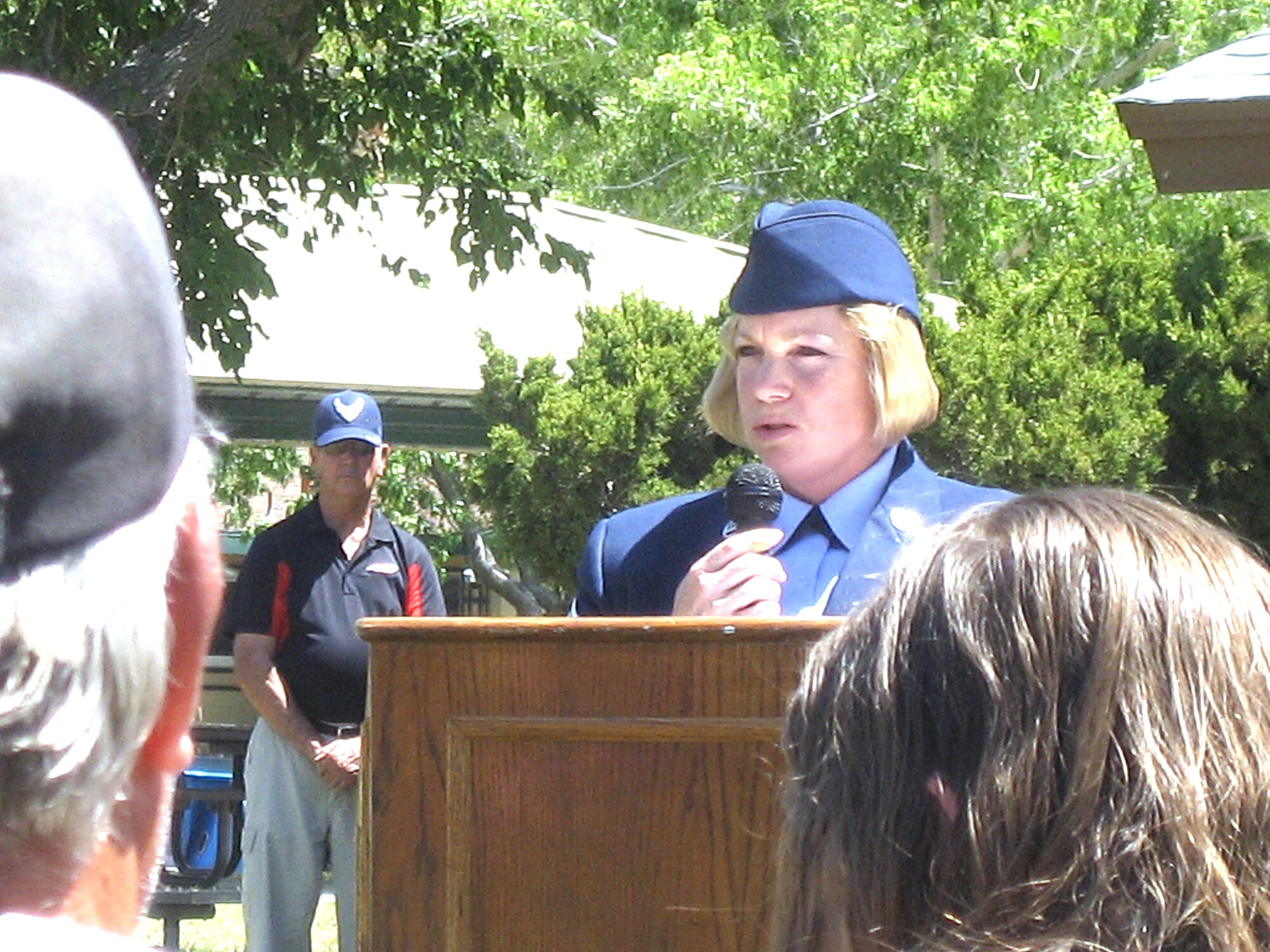 Chief Master Sgt. Lisa Richards, 95th Medical Group superintendent, speaks to more than 50 Rosamond residents at Glendower Park on at the annual Veterans of Foreign Wars-sponsored Memorial Day observance, reminding them of the sacrifices American service men and women have made in defense of their country. (U.S. Air Force photo by Dennis Shoffner)