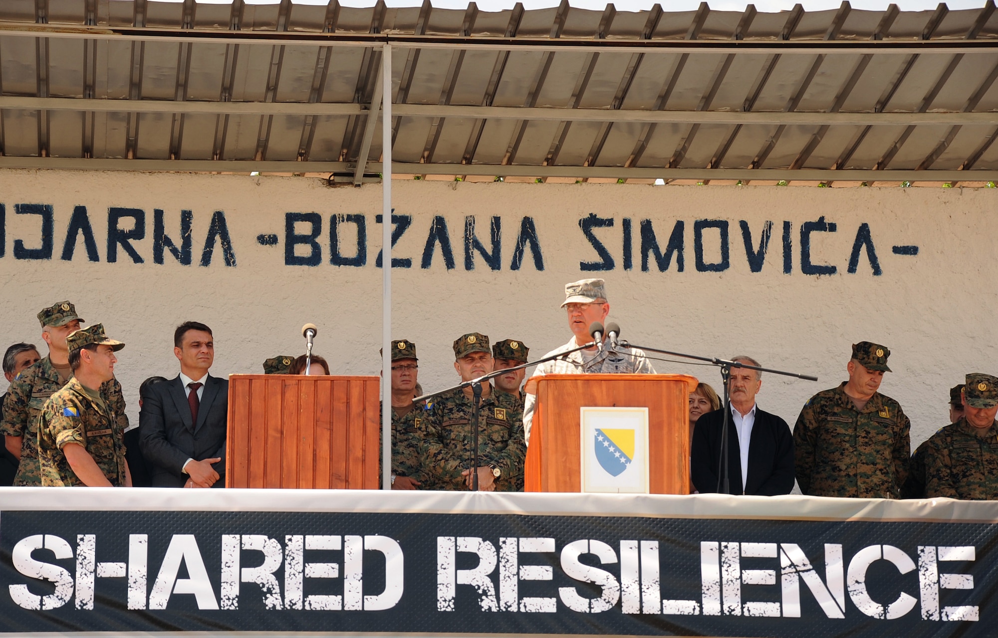 U.S. Air Force Col. Robert Marks, the Shared Resilience 2012 co-director, addresses ceremony attendees during the exercise’s opening ceremony at Capljina, Bosnia and Herzegovina, May 28, 2012. The exercise, in the spirit of partnership for peace, directly supports U.S. European Command's theater cooperation efforts and strategy for active security with European countries. (U.S. Air Force photo/1st Lt. Jason Smith)