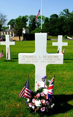 MADINGLEY, England -- The U.S. flag is flown at half staff during the Madingley American Cemetery Memorial Service near Cambridge May 28, 2012. The annual ceremony is hosted by RAF Mildenhall in remembrance of those who gave their lives to achieve victory in Europe against Axis powers. (U.S. Air Force photo/Senior Airman Ethan Morgan)
