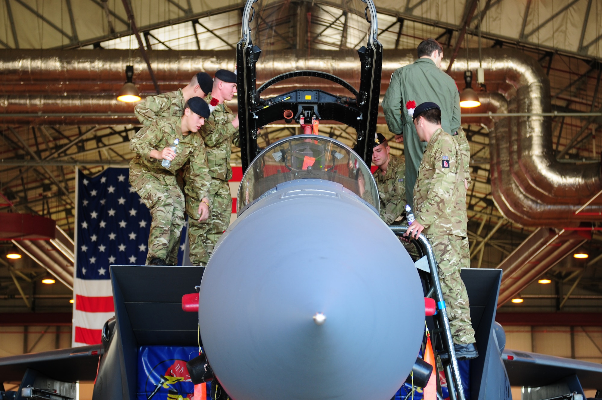 ROYAL AIR FORCE LAKENHEATH, England – Members of the British Army 2nd Battalion Royal Regiment of Fusiliers, C Company, get a close look at an F-15E Strike Eagle May 25, 2012. The soldiers visited RAF Lakenheath for a chance to become familiar with the wing’s aircraft and aircrew.  (U.S. Air Force photo by Airman 1st Class Cory D. Payne)
