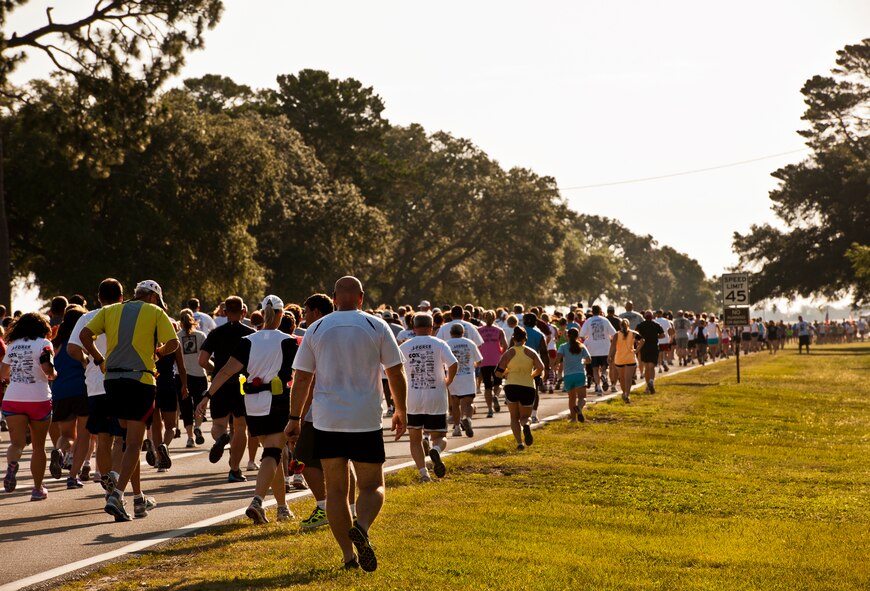 Runners and walkers spread out across Eglin Boulevard during the Gate-to-Gate run May 28 at Eglin Air Force Base, Fla.  More than 1,600 people ran in the annual Memorial Day event.  (U.S. Air Force photo/Samuel King Jr.)