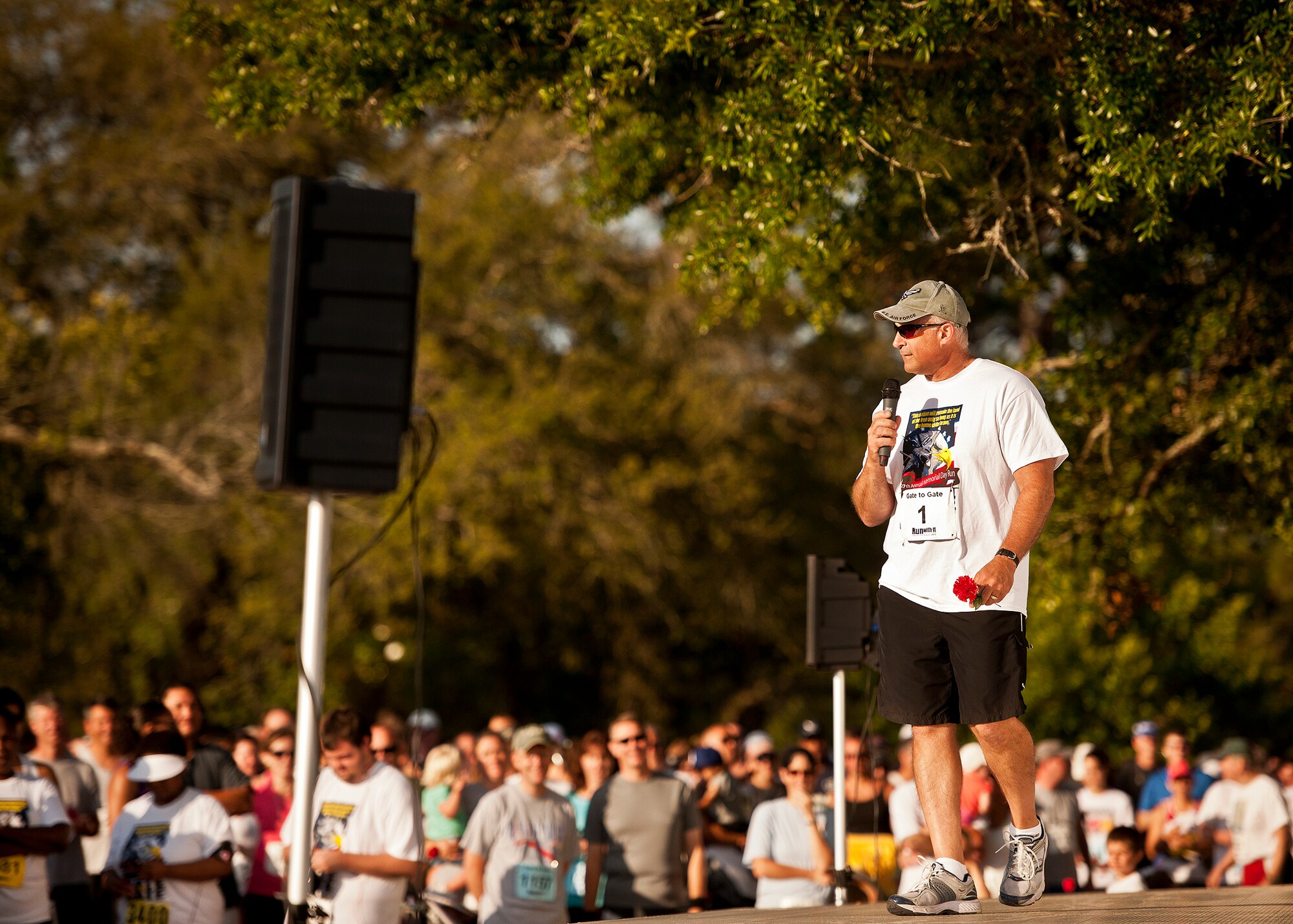 Maj. Gen. Kenneth Merchant, the Air Armament Center commander, pumps up the crowd prior to the Gate-to-Gate run May 28 at Eglin Air Force Base, Fla.  More than 1,600 people ran in the annual Memorial Day event.  (U.S. Air Force photo/Samuel King Jr.)