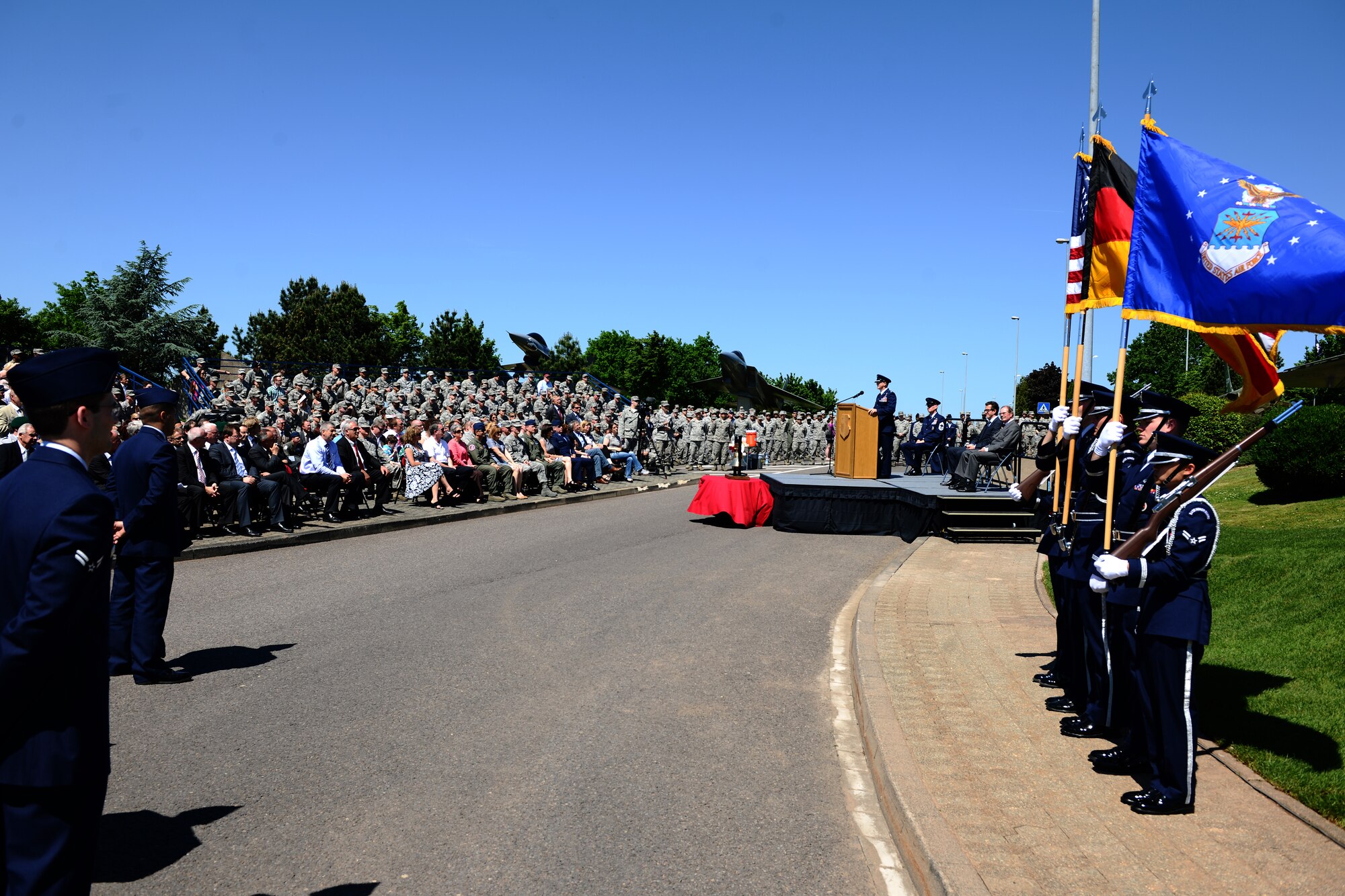 SPANGDAHLEM AIR BASE, Germany – Col. Chris Weggeman, 52nd Fighter Wing commander, speaks during the 9/11 memorial dedication and wreath-laying ceremony here May 25. The 9/11 memorial was donated to the 52nd FW by the Host Nation Council Spangdahlem and local businesses.  The sculpture was designed by Hubert Kruft, artist, from Niederpruem. (U.S. Air Force photo by Airman 1st Class Matthew B. Fredericks/Released)