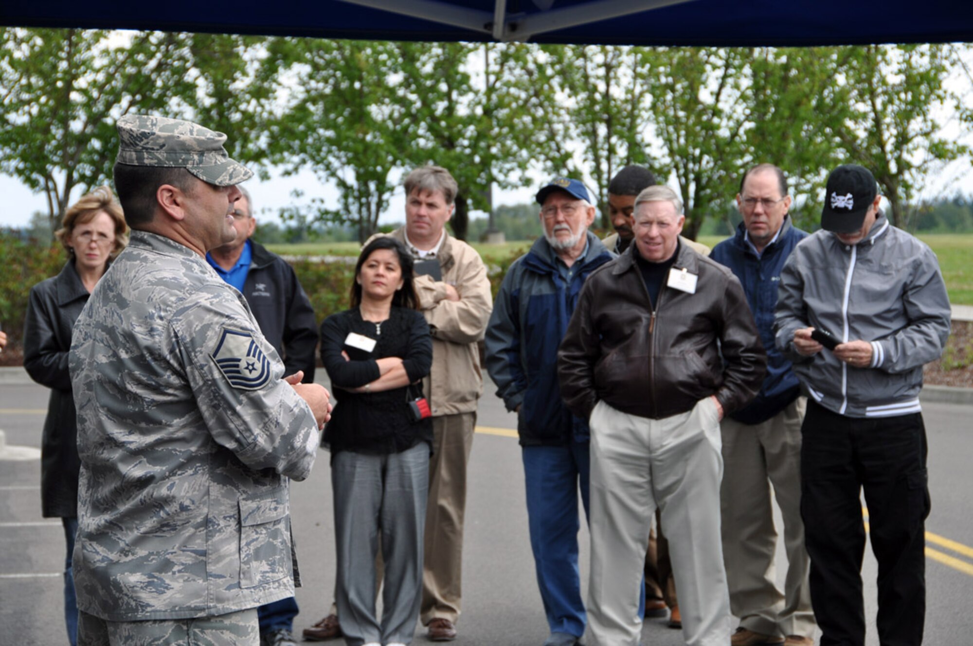 Master Sgt. Travis Hargitt with the 446th Airlift Wing explosive ordnance disposal, explains the details of his job and the weapons he encounters to the 307th Bomb Wing/917th Fighter Group Civic Leader Tour at Joint Base Lewis-McChord May 23-24, 2012.  The purpose of the tour was to give local Shreveport-Bossier City civic leaders a broader understanding of what the Air Force Reserve is about and cultivate a relationship between the reservists and the community.  (U.S. Air Force photo/Master Sgt. Mary Hinson)