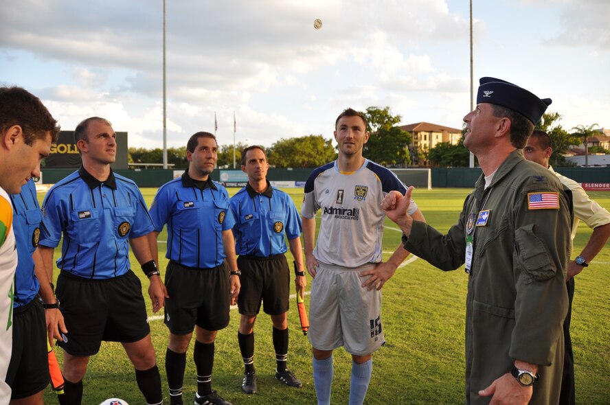 ST. PETERSBURG, Fla. - Colonel Ted Mathews, Jr., vice commander of the 927th Air Refueling Wing, tosses the game coin Friday at the opening of the Tampa Bay Rowdies soccer match against the Minnesota Stars Football Club. The Rowdies honored Colonel Mathews as part of their military appreciation night this Memorial Day weekend. 